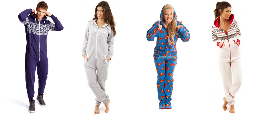 1 man and 3 women wearing winter onesies