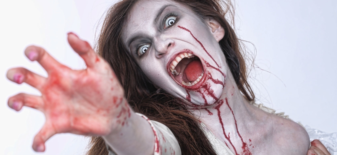 bleeding psychotic woman in a horror themed image