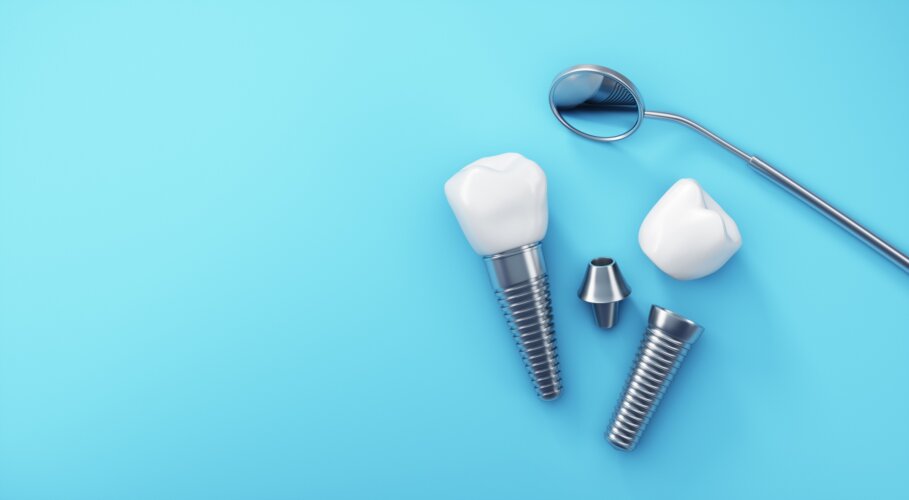 Dental implants isolated on blue background